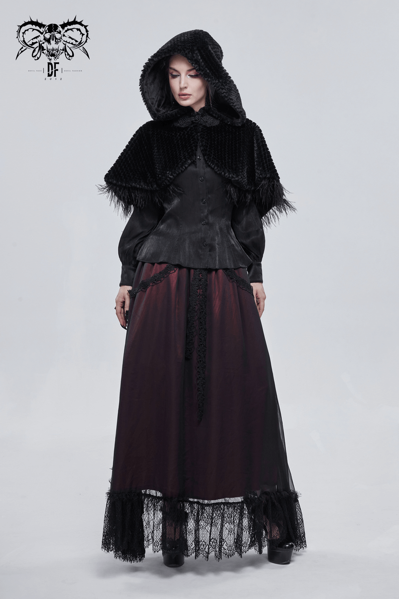 Gothic women's black hooded cape with feather details, styled with a vintage touch, perfect for gothic fashion enthusiasts.