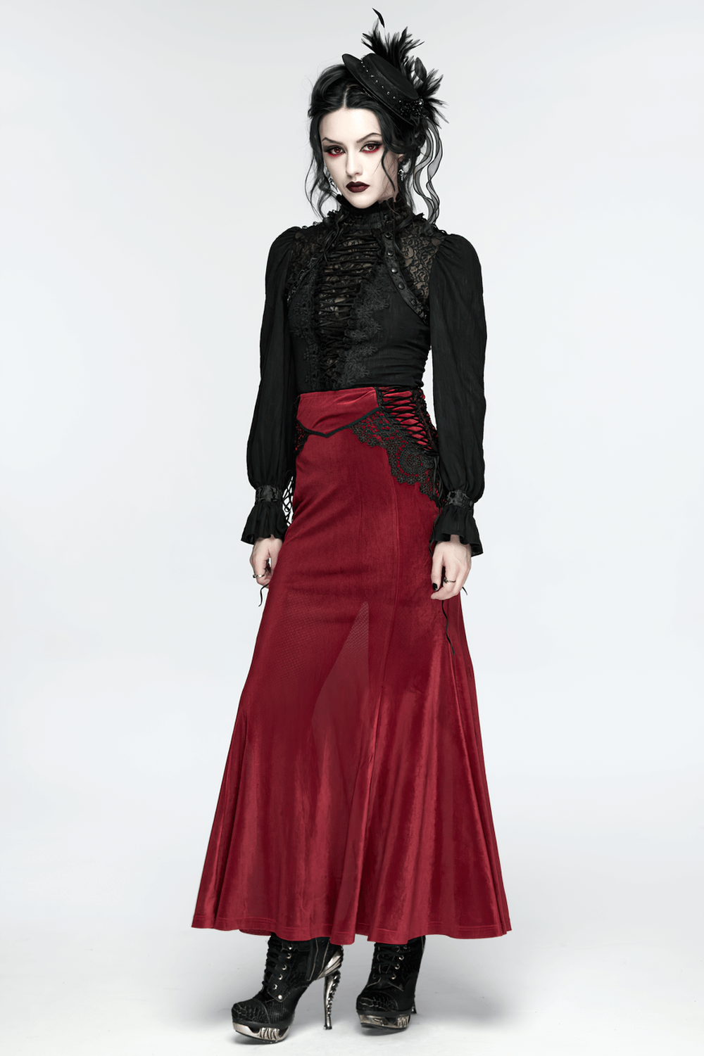 Gothic Feather Mini Hat with Ribbons and Vintage Flair worn with a dramatic gothic outfit.