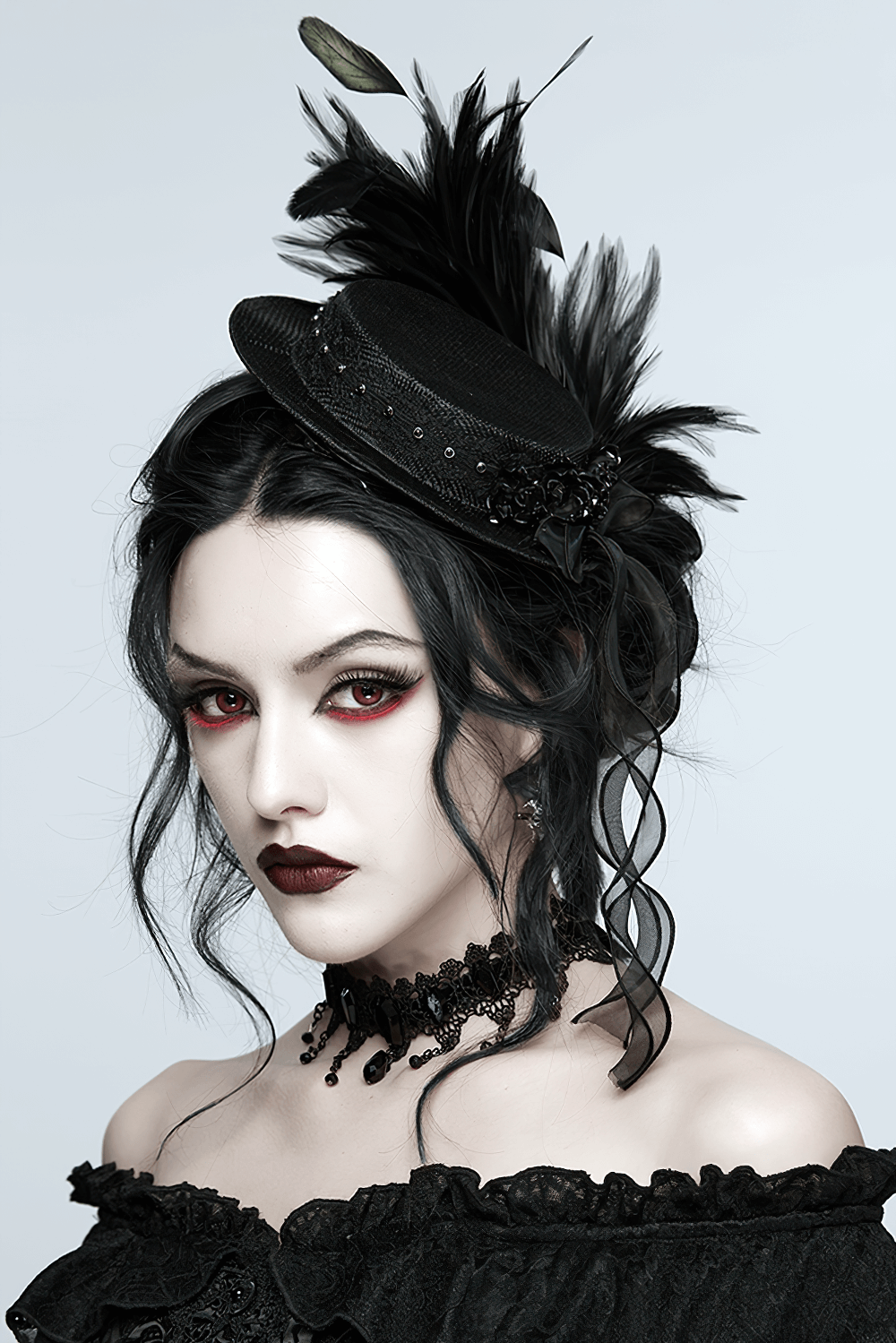 Gothic Feather Mini Hat with Ribbons and Vintage Flair worn by model, showcasing dramatic gothic style and elegance.