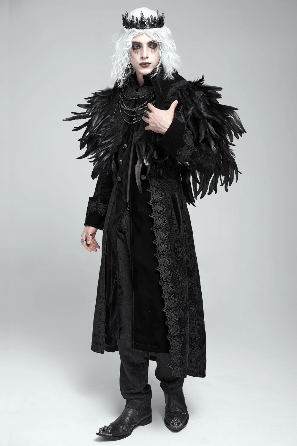 Gothic Feather Shoulder Cape with Lace and Chains worn by a model with dramatic gothic styling and a crown.