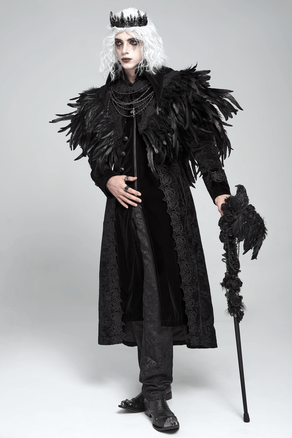 Gothic Feather Shoulder Cape with Lace and Chains worn by a model with dramatic feathers and a royal crown.