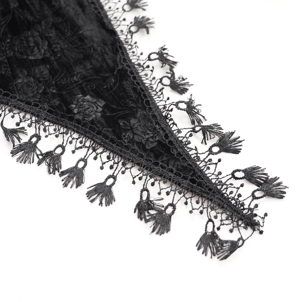 Intricate lace trim and feather accents on a gothic black cape with rose designs. Perfect for a dramatic fashion statement.