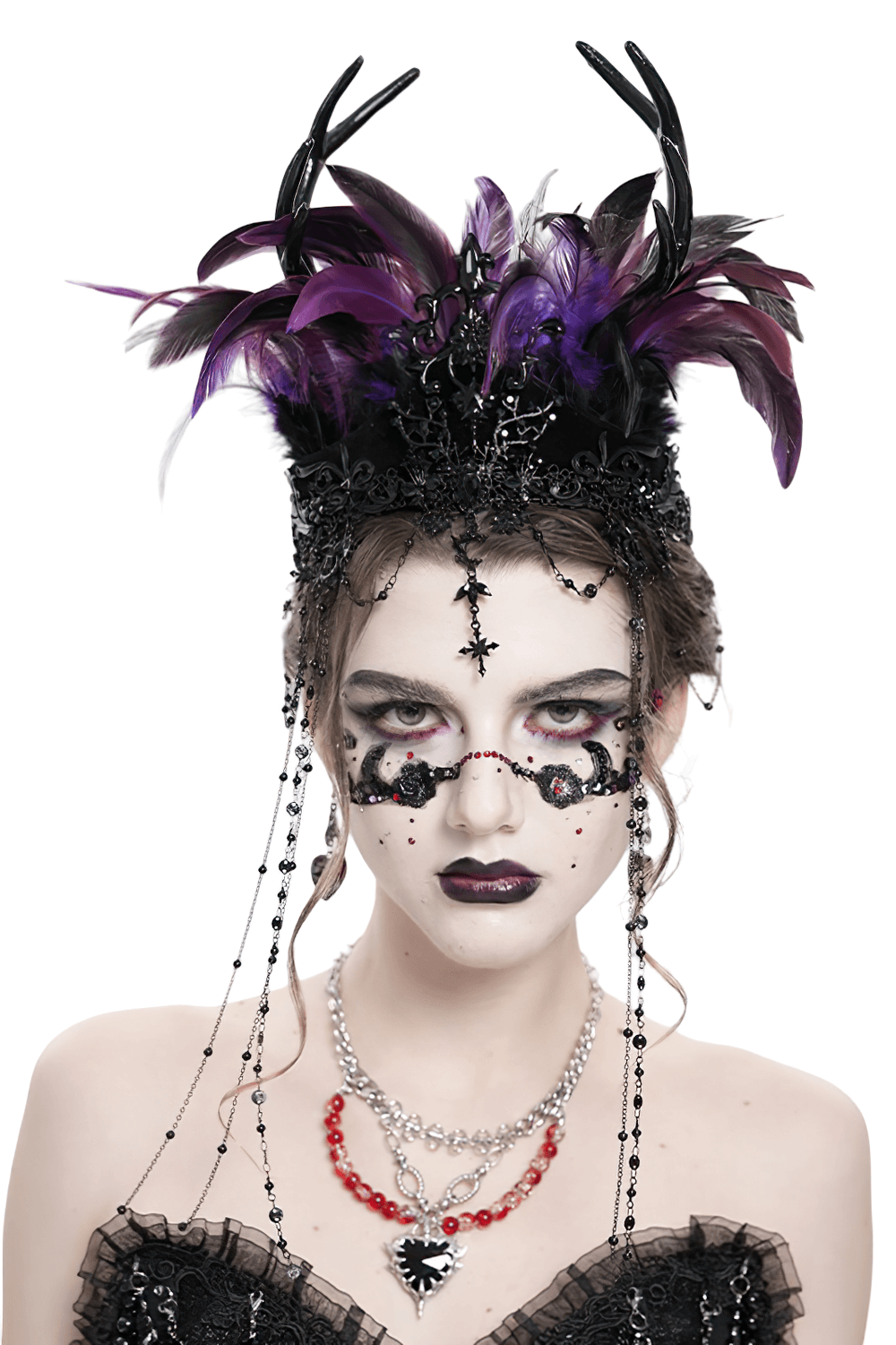 Gothic feathered headpiece with purple and black feathers, chains, and cross ornaments, worn by a model.