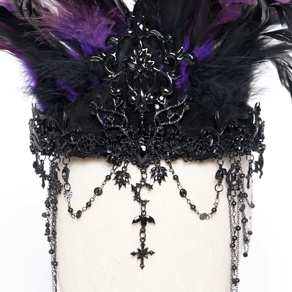 Gothic feathered headpiece in black and purple with chains and cross ornaments, adding dark elegance to any outfit.