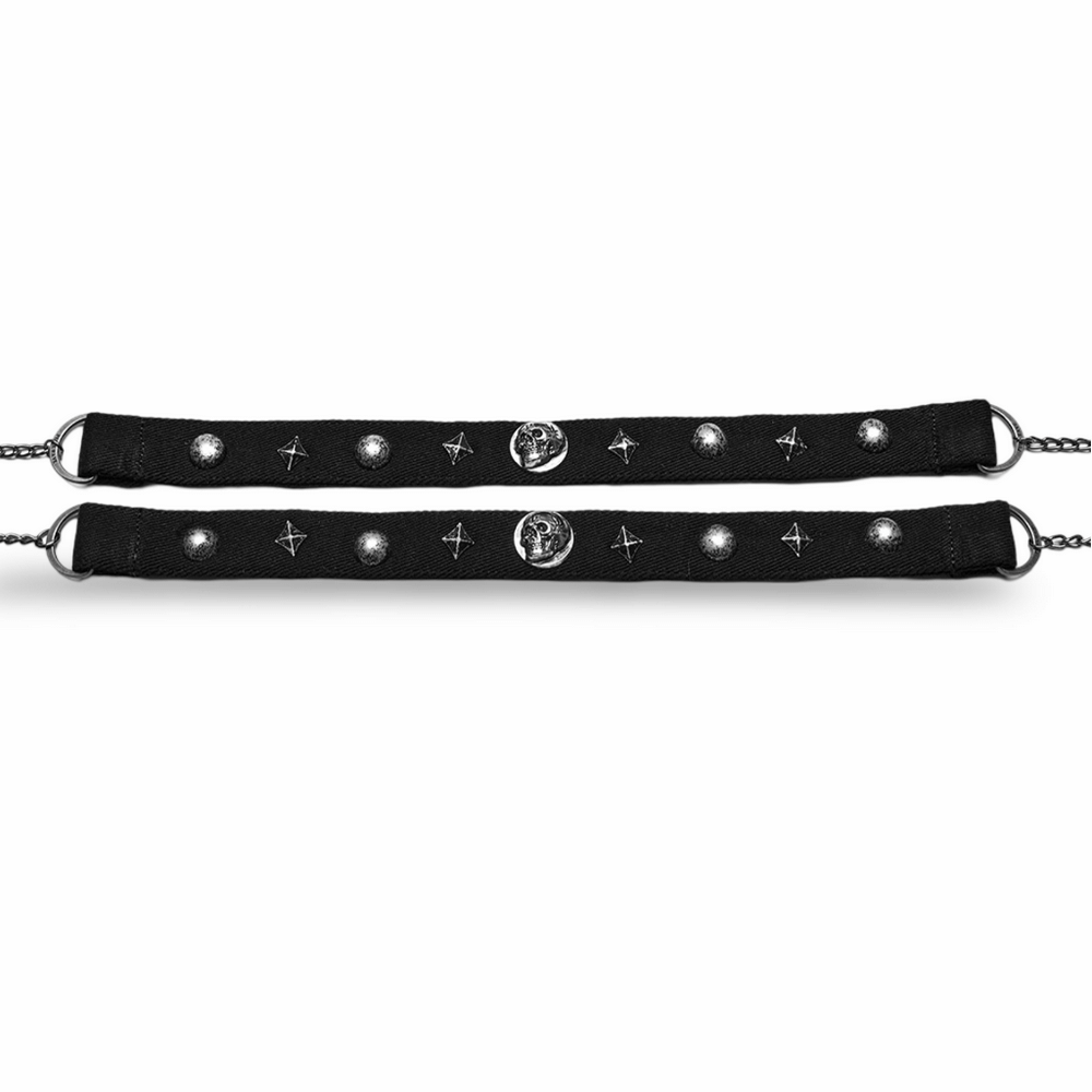 Edgy black double choker with silver skulls and stars, perfect for gothic and punk styles.
