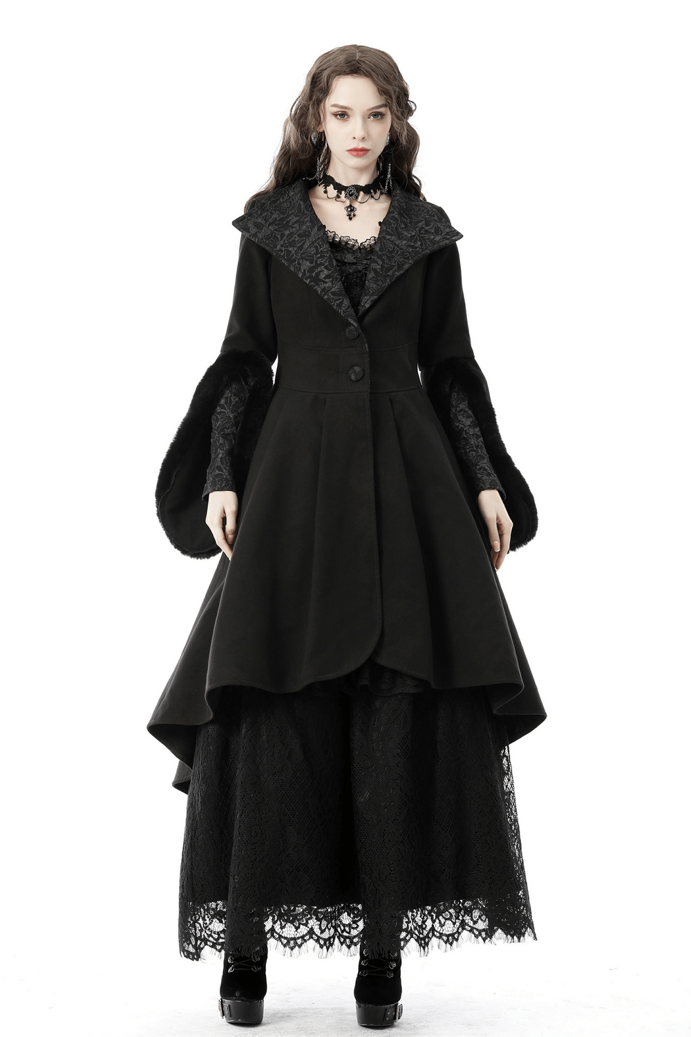Gothic female model wearing a stunning black hooded cocktail coat with flared sleeves, embodying elegance and edge.