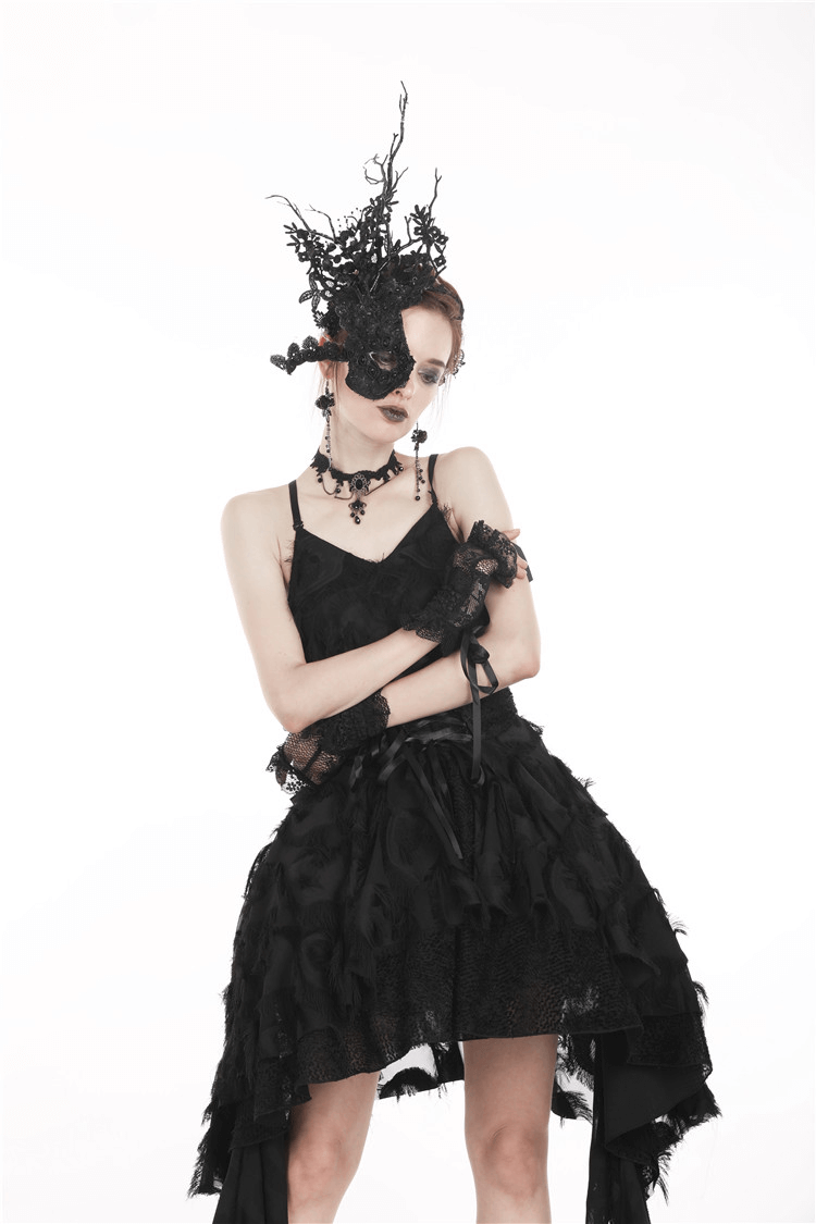 Gothic female model in black lace fingerless gloves with ruffles, dramatic dark fashion ensemble, perfect for Halloween.