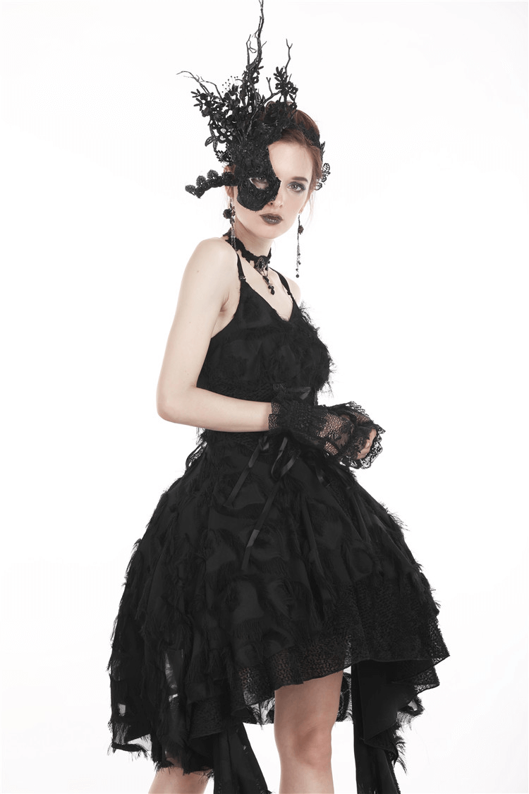 Gothic female model in black ruffled dress and lace fingerless gloves, showcasing edgy elegance for dark fashion.