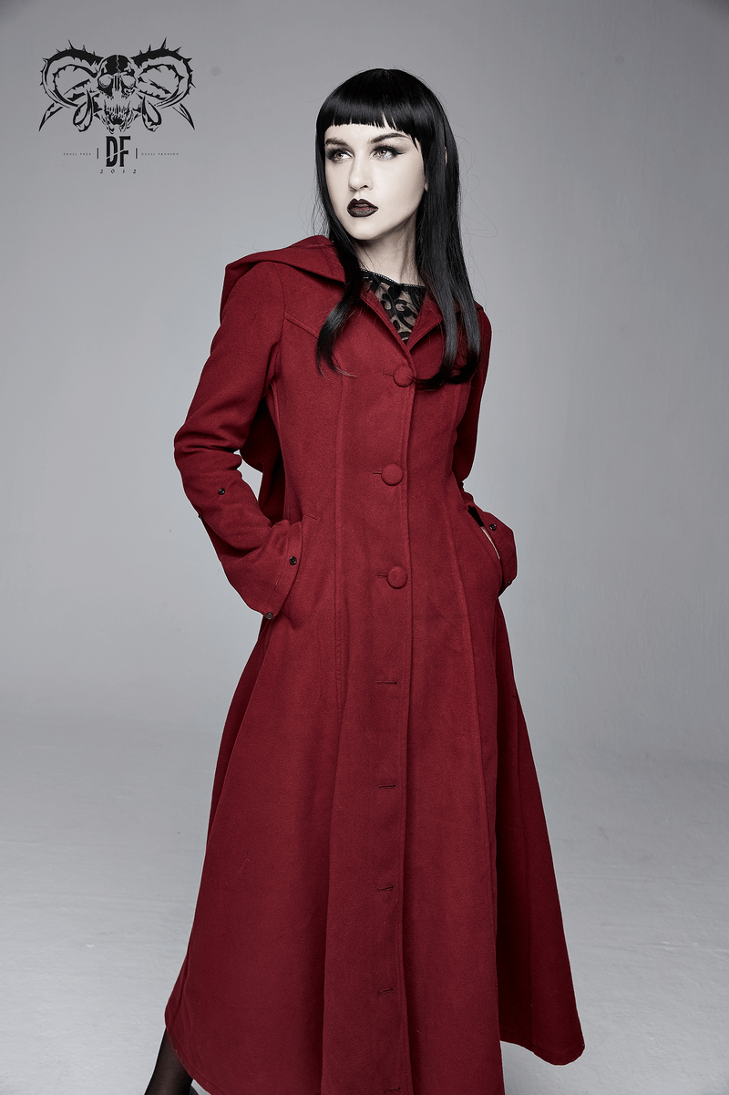 Gothic female model in a stylish red long coat with removable fur collar, showcasing vintage fashion elegance.