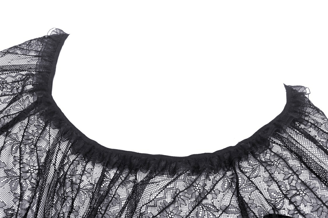 Close-up of the neckline of a Gothic sheer black lace top with ruffled edges and floral details.