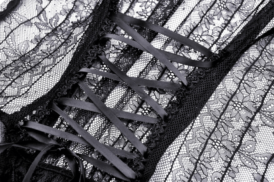 Close-up of Gothic sheer black lace top with intricate lace detailing and satin ribbon lacing, perfect for dramatic styling.