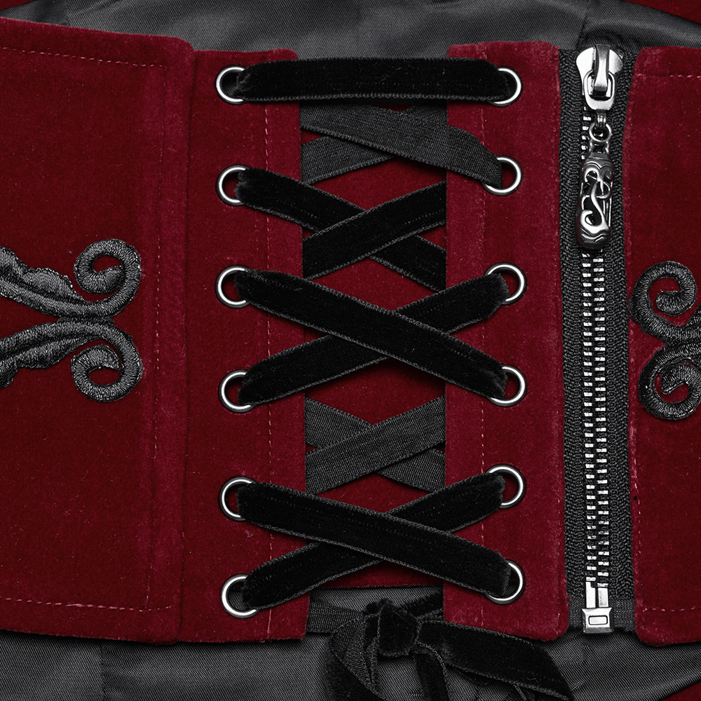 Gothic velvet corset waistband with black lace-up back and intricate floral embroidery detail.