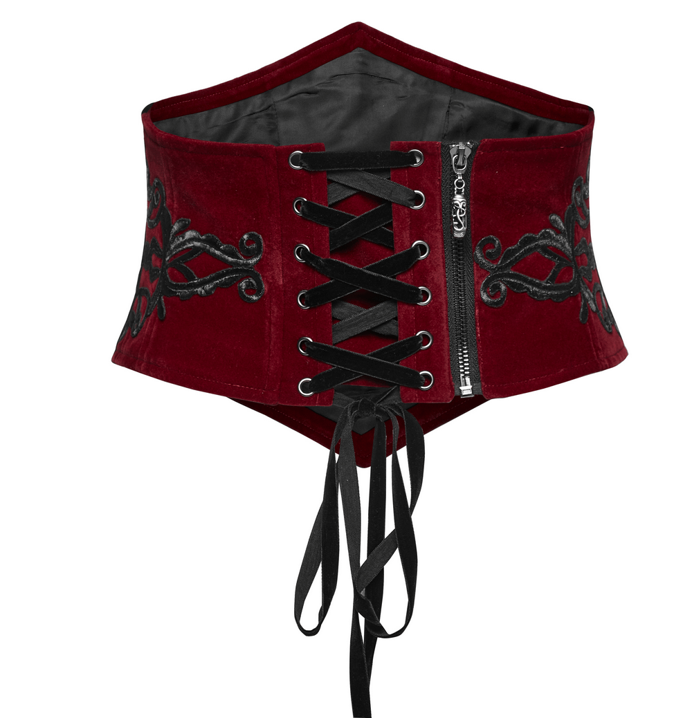 Gothic female velvet corset waistband with black floral embroidery and lace-up back.