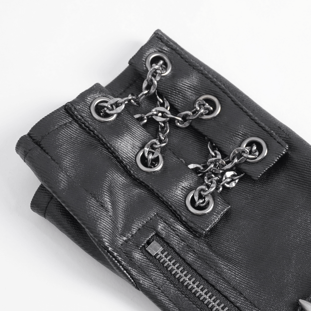 Close-up of Gothic fingerless gloves featuring chain and bullet details, showcasing a chic zipper closure and edgy design.