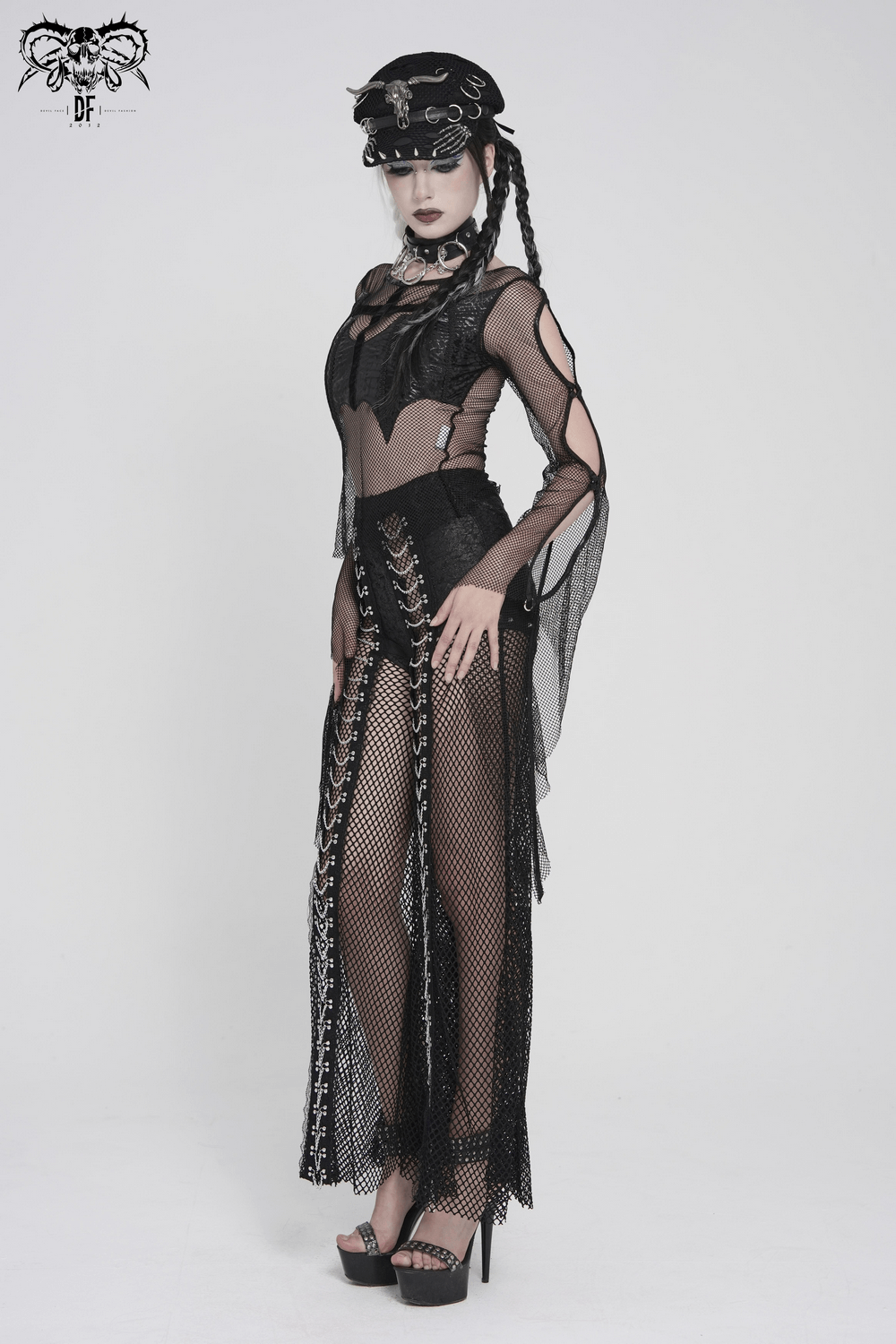 Gothic Fishnet Mesh Top with Bat Applique Sleeves for Women styled with a dramatic sheer look and edgy accessories.