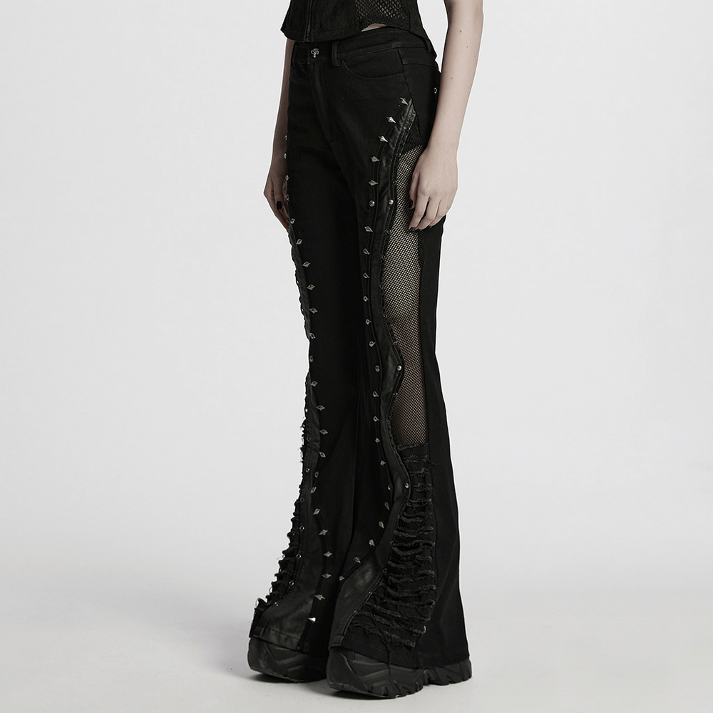 Gothic flared pants with studs and mesh panels, showcasing a punk street style with a distressed look.