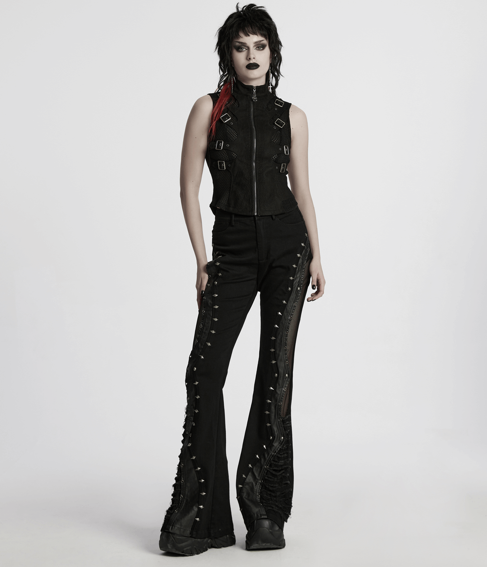 Gothic flared pants with studs and mesh panels, styled with edgy punk fashion for a rebellious look.