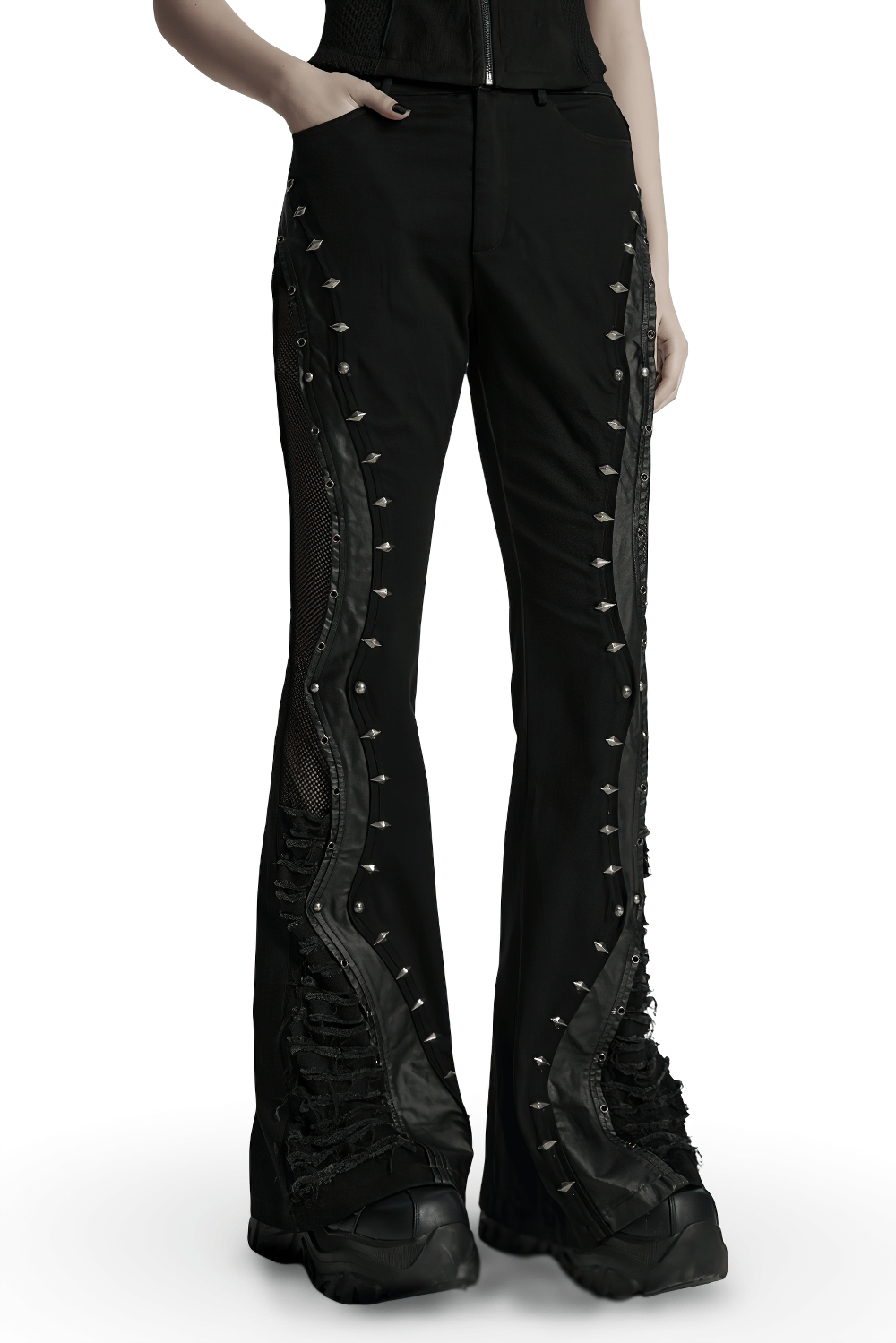 Gothic flared pants with studs and mesh panels, featuring edgy faux leather details and a punk street style.