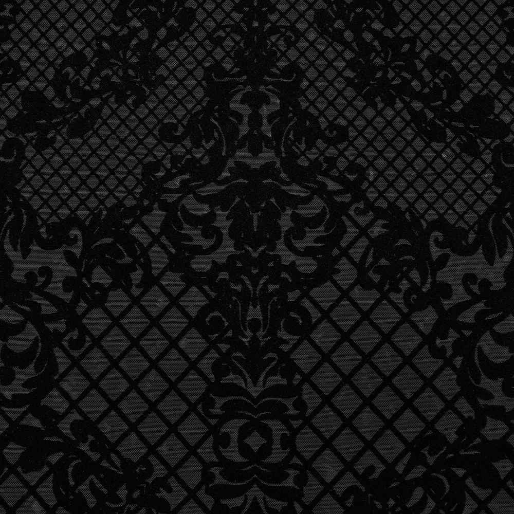 Intricate black flocked mesh fabric design featuring Victorian-inspired gothic patterns.