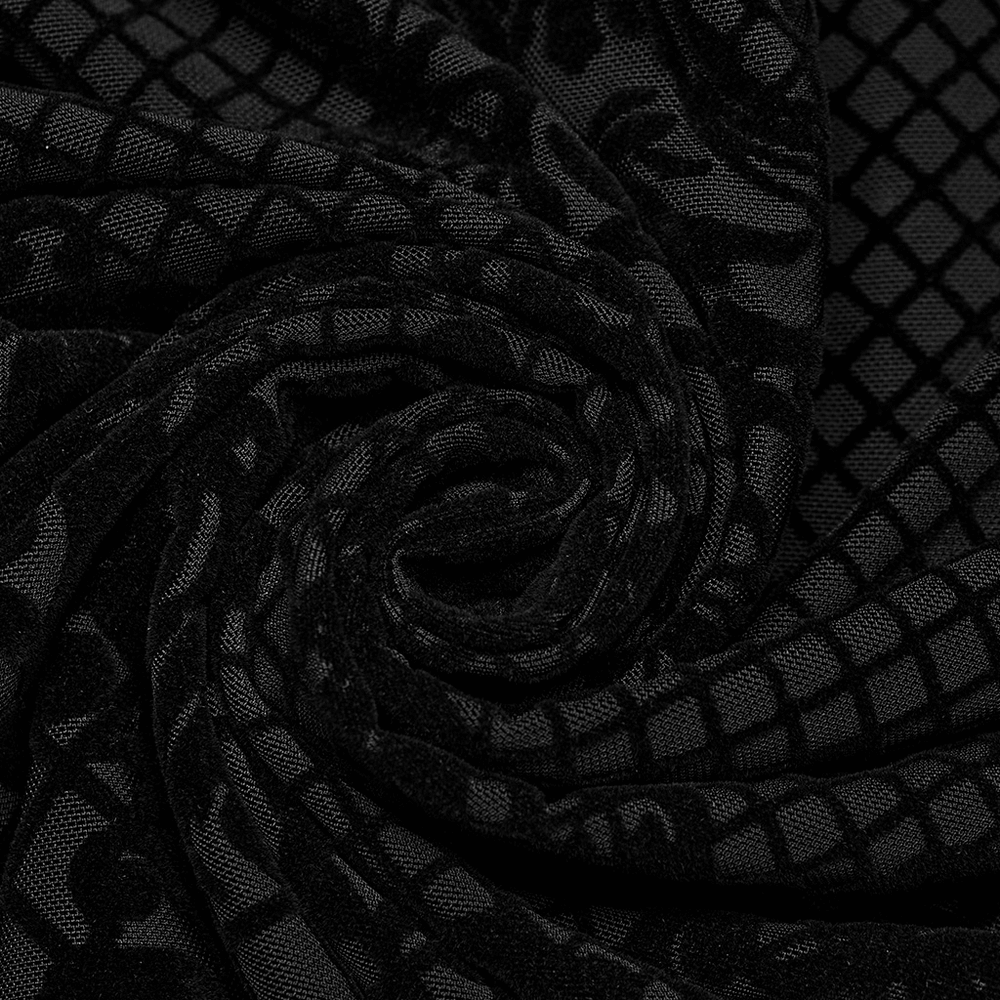 Close-up of black flocked mesh fabric with intricate Gothic patterns, perfect for a Victorian-inspired top.