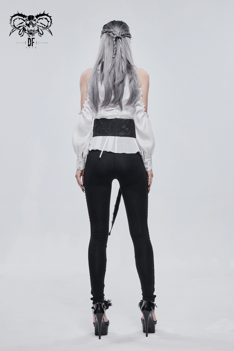 Rear view of a model wearing a gothic floral adjustable black wide belt with punk style outfit and heels.