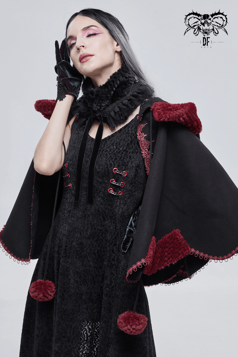 Women wearing a gothic black cape with red pompons and embroidery, perfect for adding flair to gothic fashion.