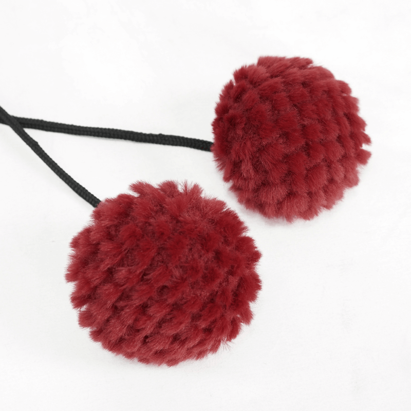 Red pompons with soft texture, perfect accents for gothic floral embroidered capes.