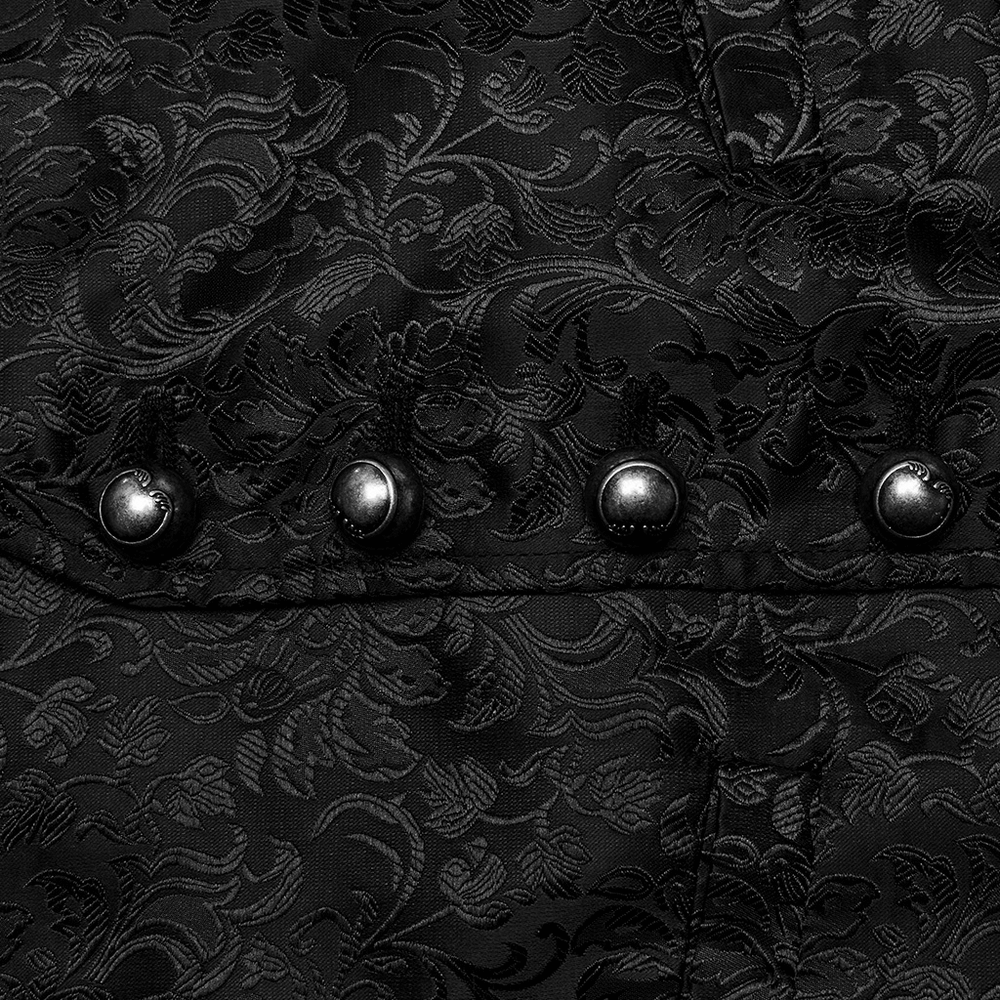 Close-up of gothic jacquard fabric with intricate floral patterns and decorative buttons.