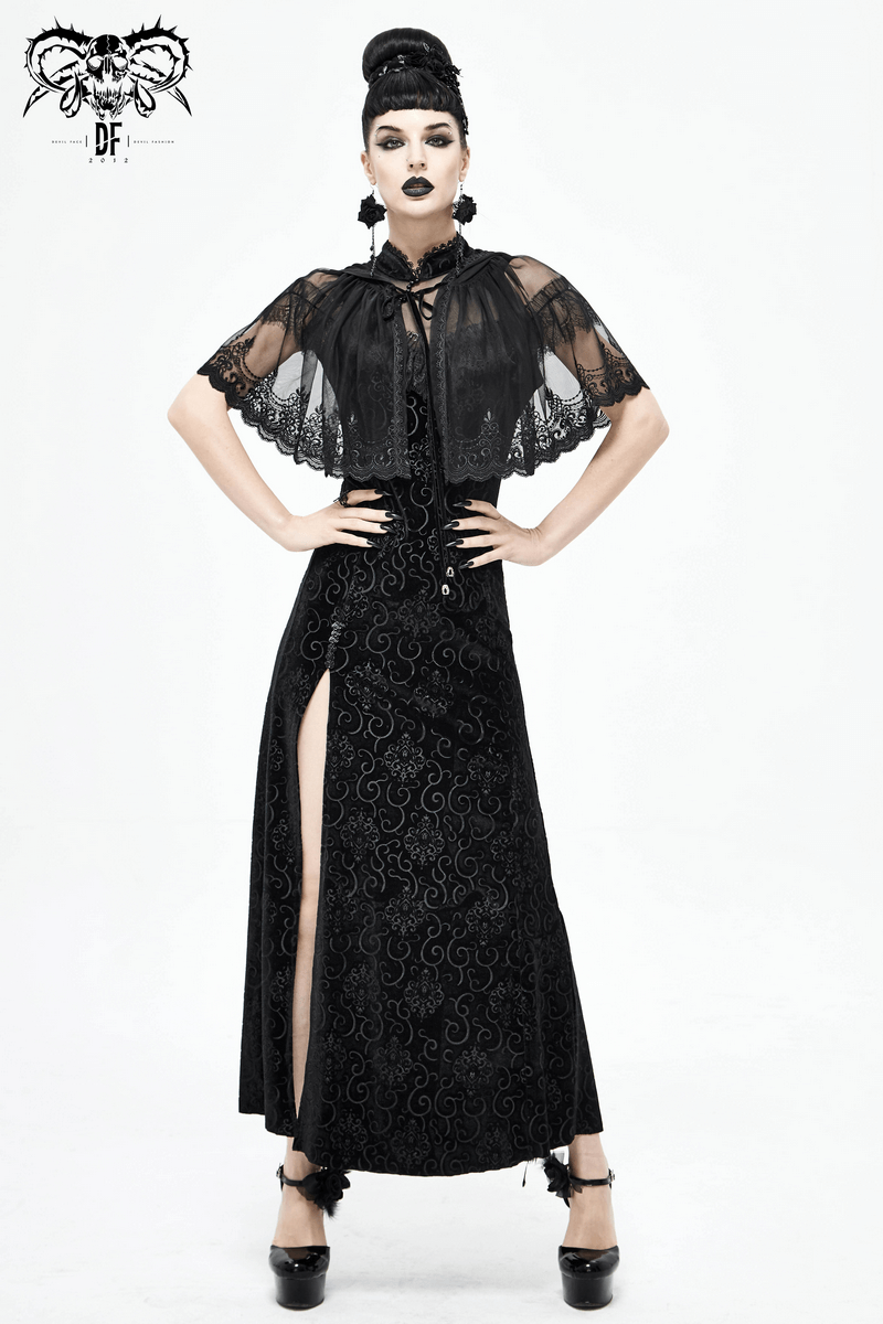 Gothic floral lace cape with hood, worn by a model in a sleek black dress, showcasing vintage elegance and dramatic style.