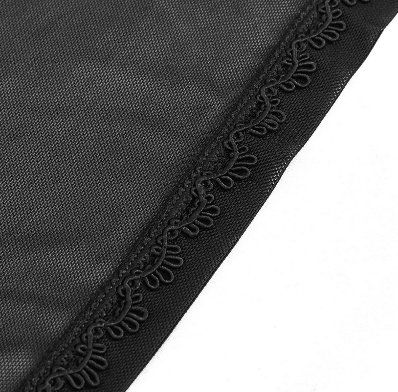 Close-up of elegant black lace trim from a gothic floral cape, showcasing intricate detailing and vintage design.