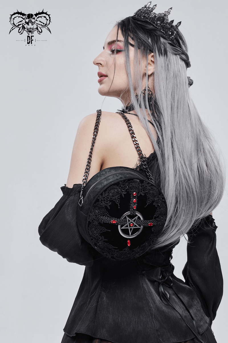 Stylish woman modeling a Gothic floral round bag adorned with a pentagram and red gems.