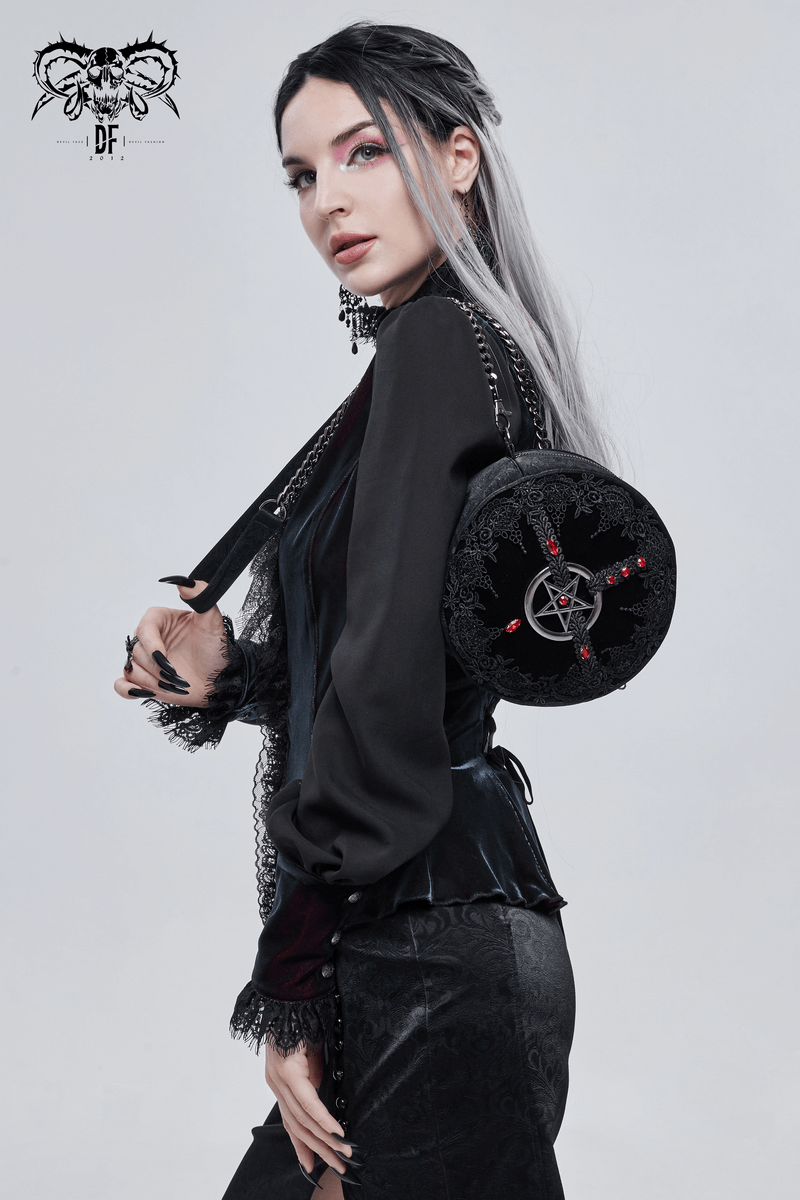 Elegant gothic round bag with pentagram, stylish black outfit, red gems, and guipure details, perfect for a chic look.