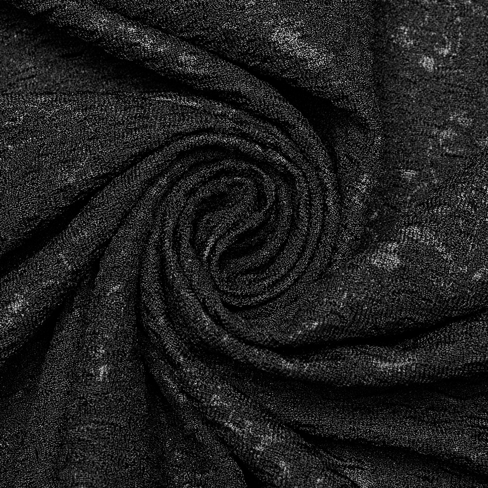 Close-up of black textured knit fabric swirling in a spiral pattern, highlighting the intricate details and soft texture.