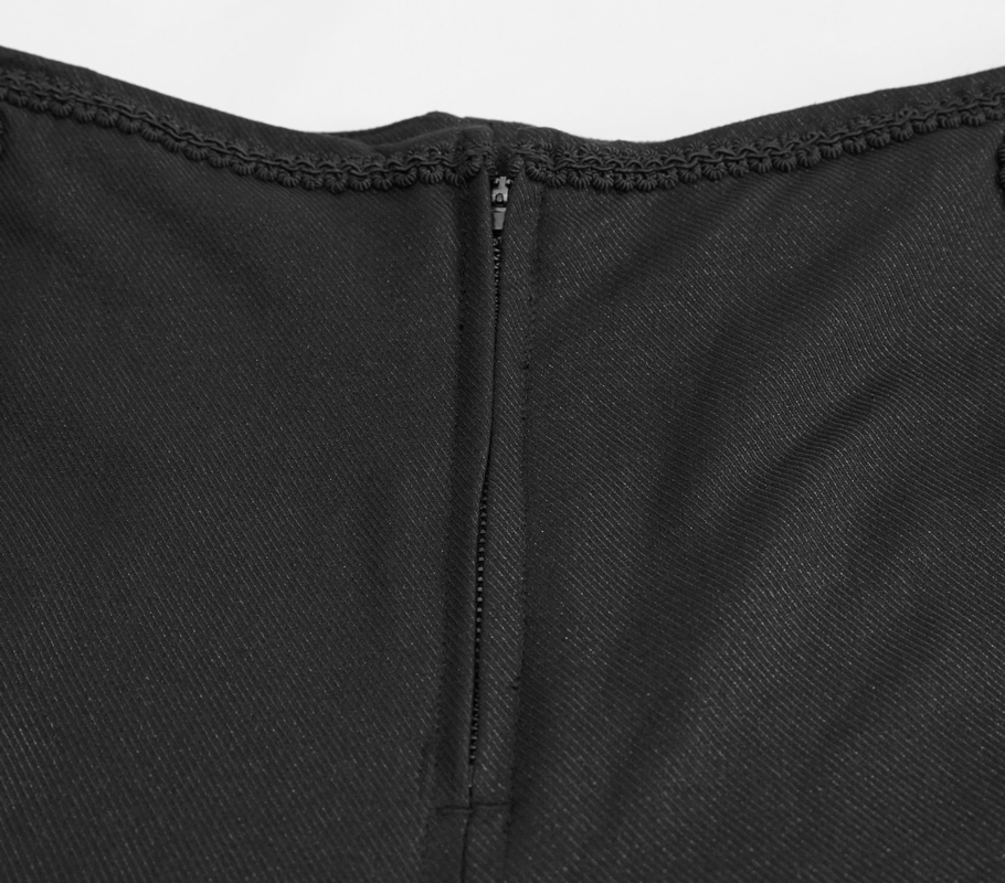 Close-up of the back zipper detail on gothic black pants with lace inserts for a stylish look.