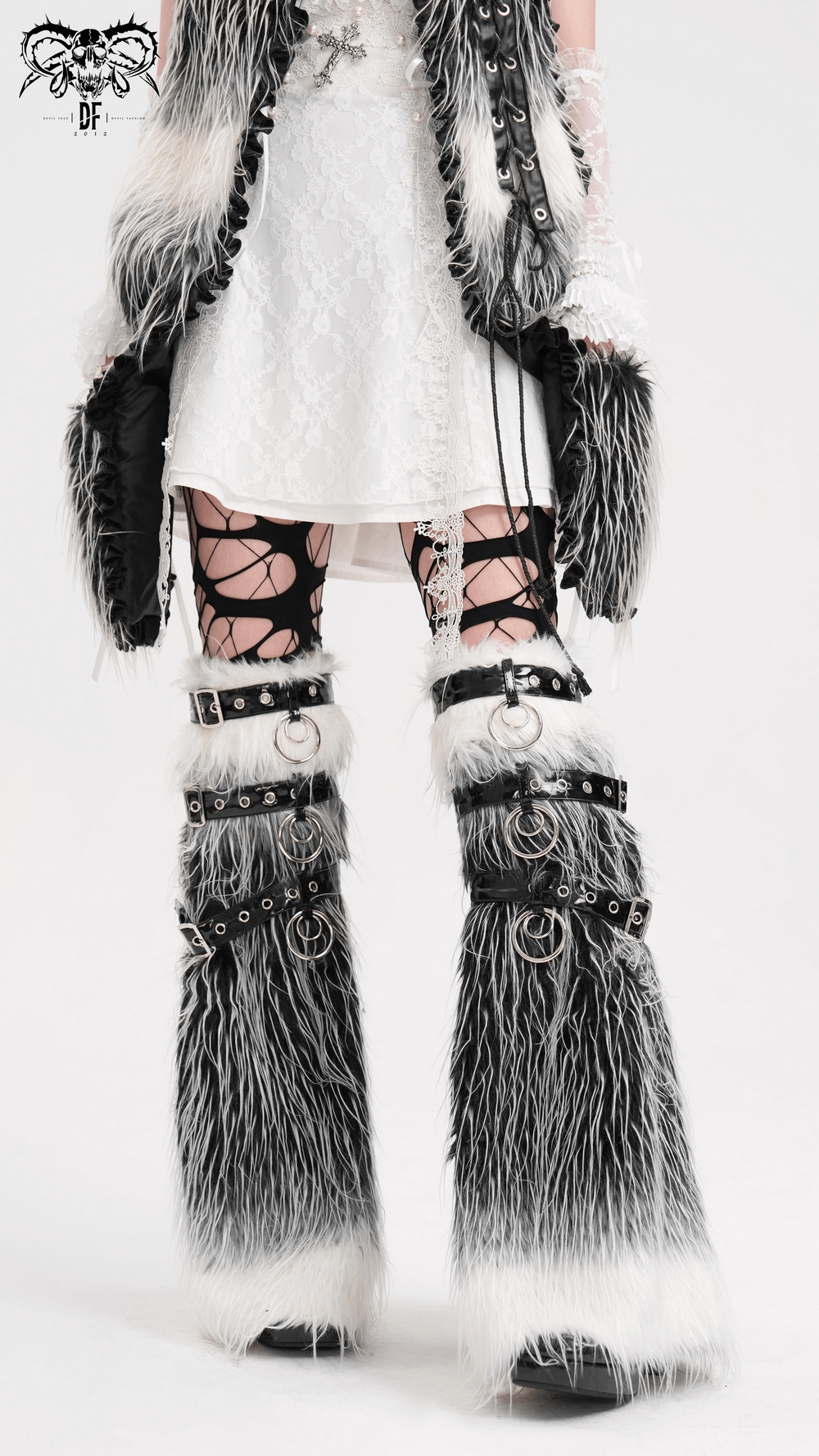 Gothic black and white faux fur leg warmers with edgy O-rings and straps for punk fashion enthusiasts. Perfect for alternative styles.