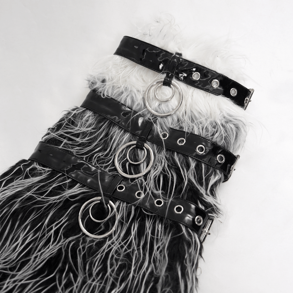 Gothic fur leg warmers with black and white faux fur, featuring O-rings and adjustable straps for a punk-inspired look.