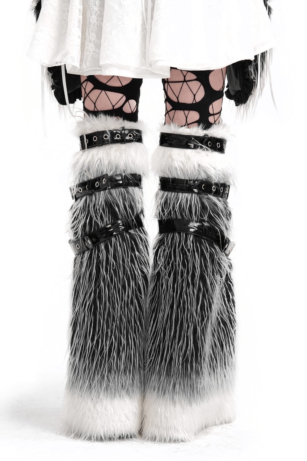 Gothic fur leg warmers with black and white faux fur, O-rings, and adjustable straps for a bold punk style. Perfect for alternative fashion.