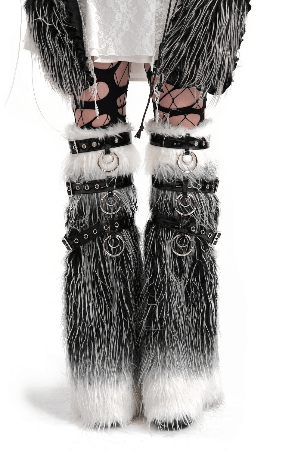 Gothic fur leg warmers with O-rings and straps, black and white faux fur, punk style with metal accents, edgy alternative fashion.