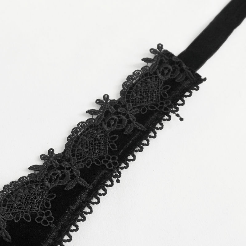 Close-up of black velvet lace trim, showcasing intricate details for gothic fashion and elegant style.