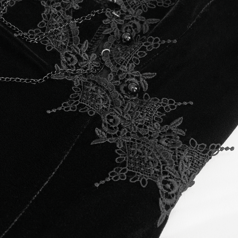 Close-up of intricate lace detailing with buttons on a gothic velvet dress, showcasing elegant gothic fashion.