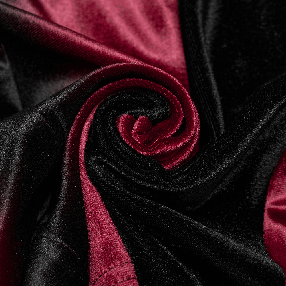 Close-up of black and burgundy velvet fabric showcasing rich textures for gothic fashion.