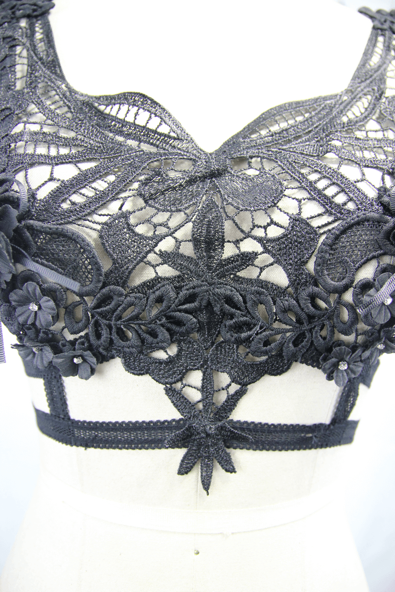 Intricate black guipure top with floral lace design and detachable feather details for a gothic-inspired look.