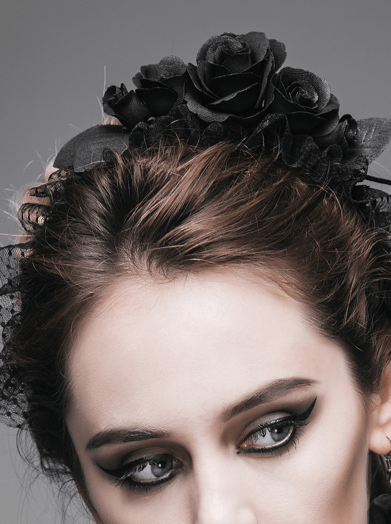Elegant women's gothic hair wreath with black roses, perfect floral accessory for a striking look.