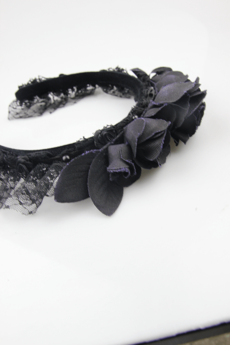 Gothic women's black floral hair wreath with rose-shaped inserts and lace details, perfect for elegant outfits.