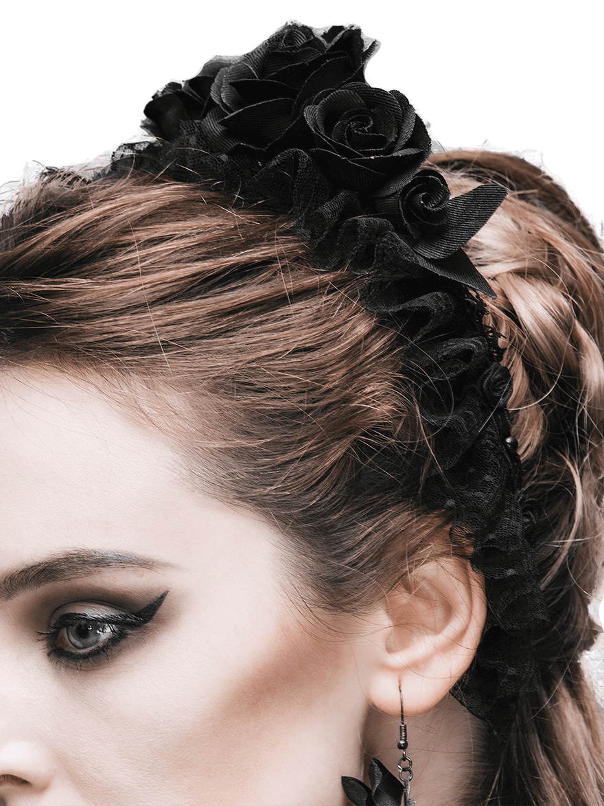 Elegant women's black floral hair wreath with roses, perfect gothic accessory for a chic look.