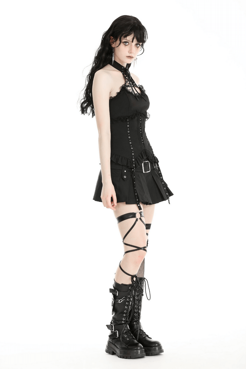 Gothic halter lace corset top with ruffle trim, stylish straps, and edgy lace-up details, paired with combat boots.