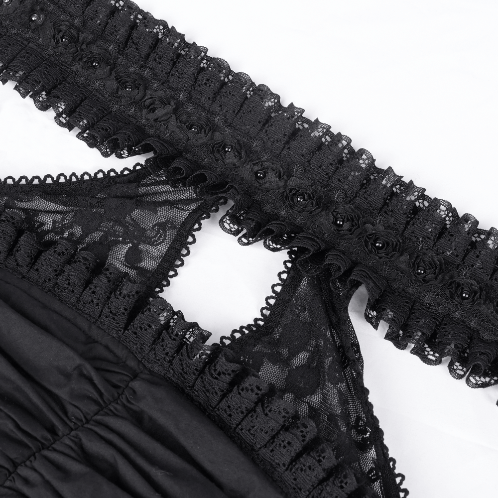 Close-up of black lace detailing and ruches on a gothic halter mini dress for women.