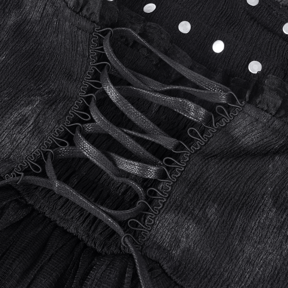 Close-up of gothic halter mini dress lace-up back with black leather straps and mesh layers.