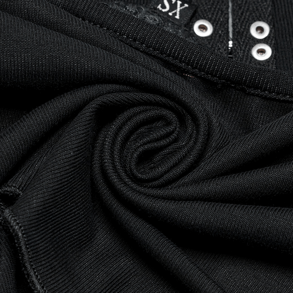 Close-up of black fabric showcasing the soft elastic texture of the Gothic halter top with ruffles.