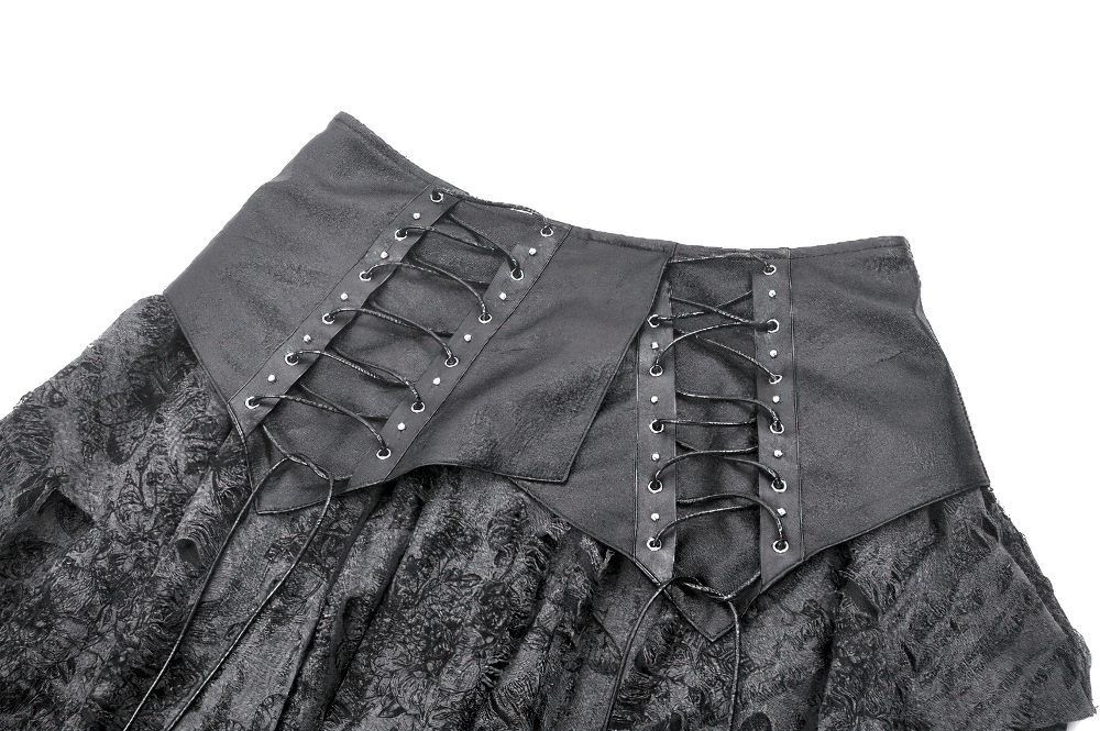 Close-up of gothic skirt's faux leather lace-up waistband, showcasing intricate corset-inspired detailing.